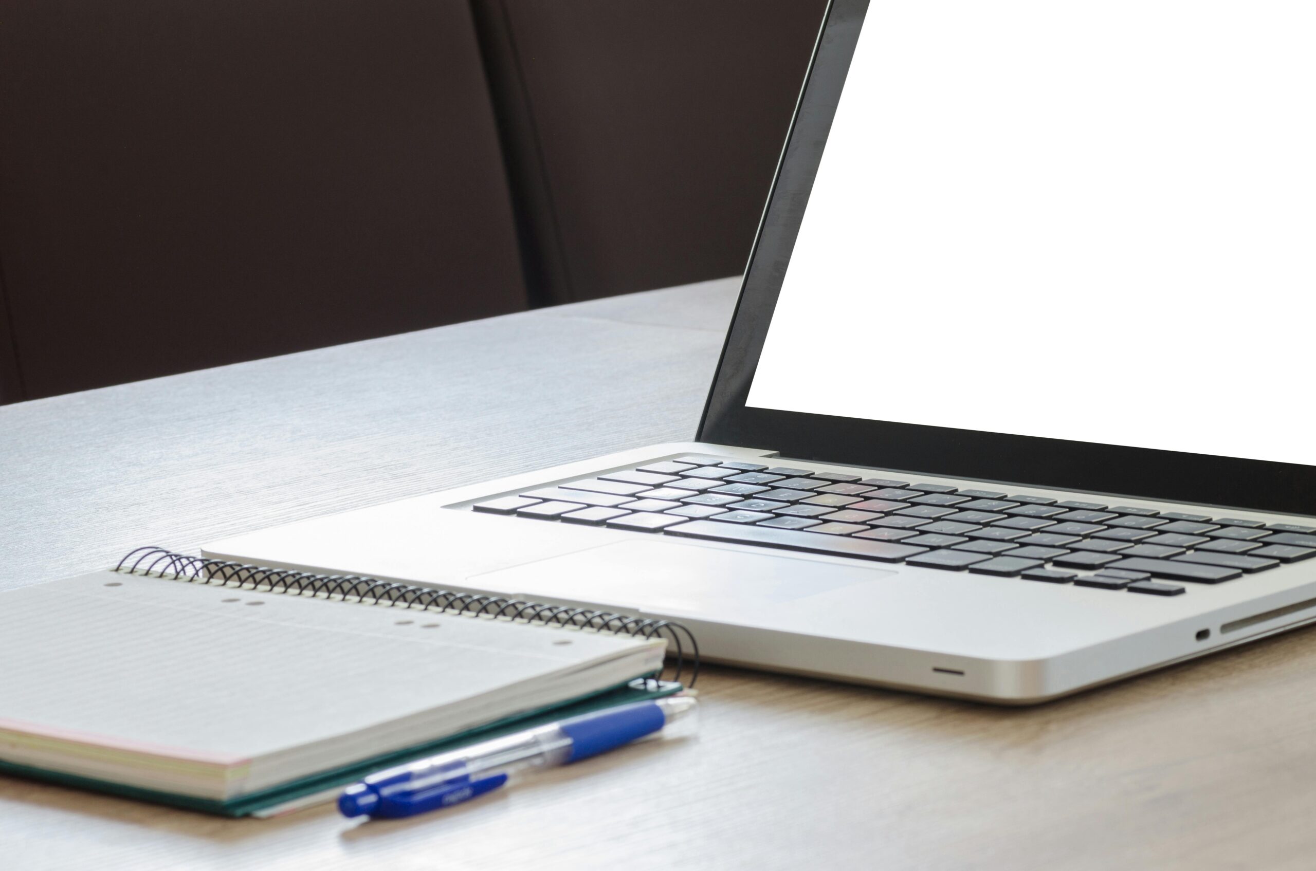 Blue Click Pen Beside Silver Laptop Computer